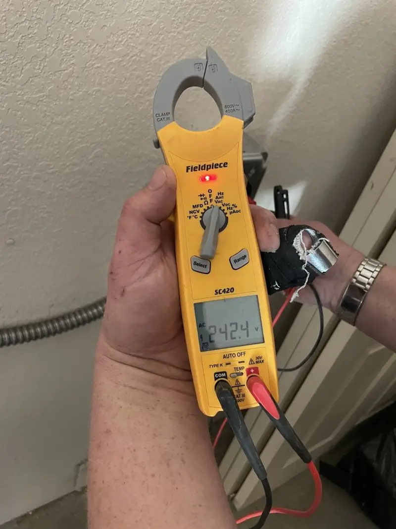 Voltage testing with clamp meter during Circuit Breaker Repair in Palmyra